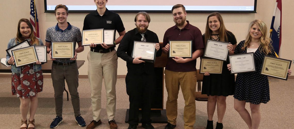 Students honored by the Missouri Broadcasters Association and the Society of Professional Journalists for their productions in “The Point,” (L-R): Taylor Flint, senior video production major; Ethan Harrison, junior video production major; Matthew Miller, junior business management major; Caleb Brubaker, senior journalism major; Ben Johnson, junior video production major; Brianna Presley, junior video production major, and alumna Lauren Presley. Both Nathaniel Snipes, junior nutrition and dietetics major, and alumnus Micah Redding were awarded but not pictured.