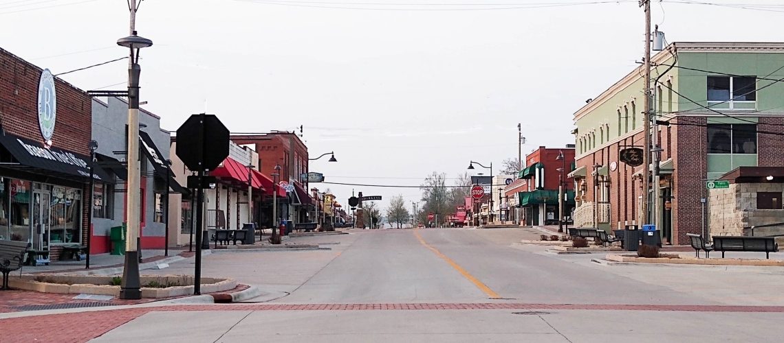 Commerical Street in Historic Downtown Branson devoid of traffic illustrates cuurrent impact of COVID-19 Virus requirement on businesses.