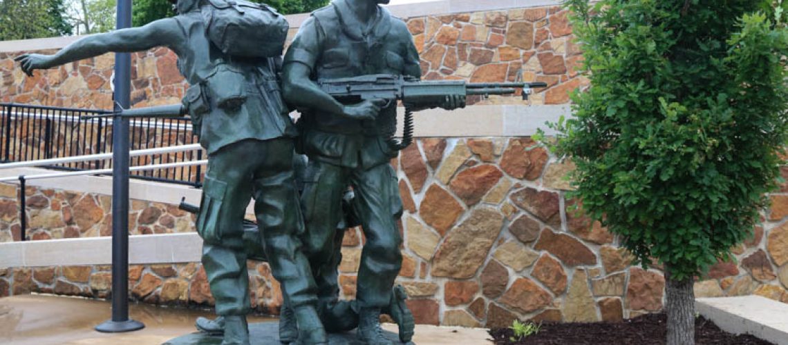 Three Man Stiate in Liberty Plaza.