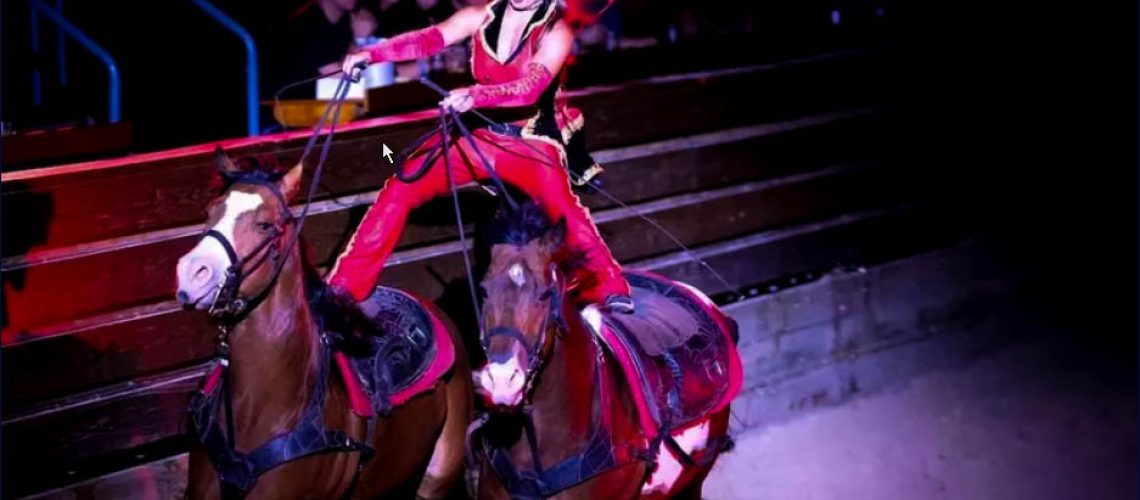 250601 Dolly Partons Stampede Front Facade Duop Horse Trick Riding (1 of 2)