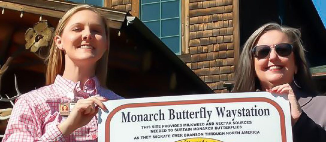 Branson Mayor, Karen Best, right, presenting Monarch Butterfly Waystation Certificate to Bass Pro Shops.